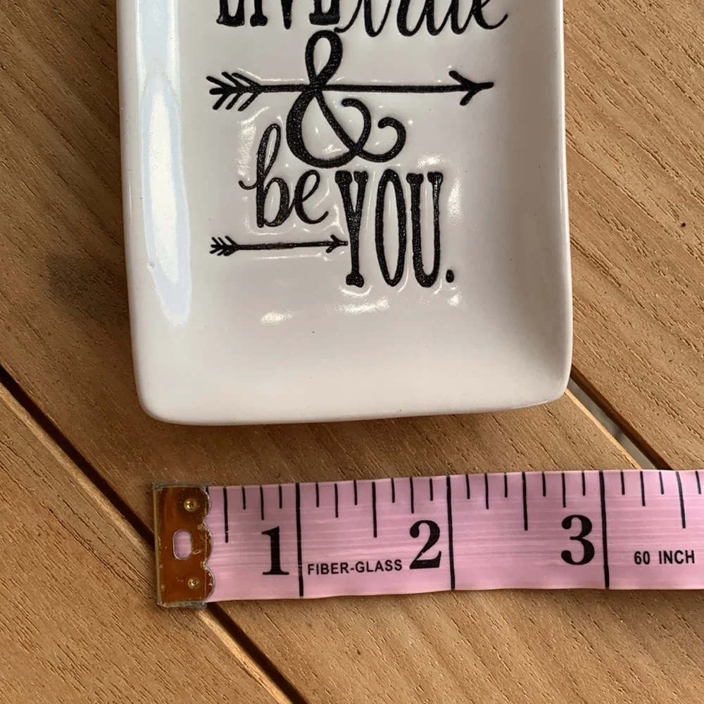 Thirty-one small jewelry tray